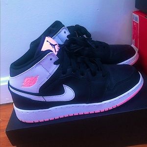 Women Pink,black,and white Jordan 1’s